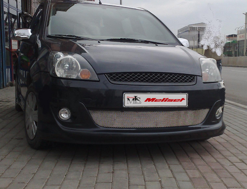 Форд фиеста 2007 кондиционер. Мини линзы Ford Fiesta 2007. Форд Фиеста 2007 бампер передний артикул. Решетка радиатора крашенная на Форд Фиеста.